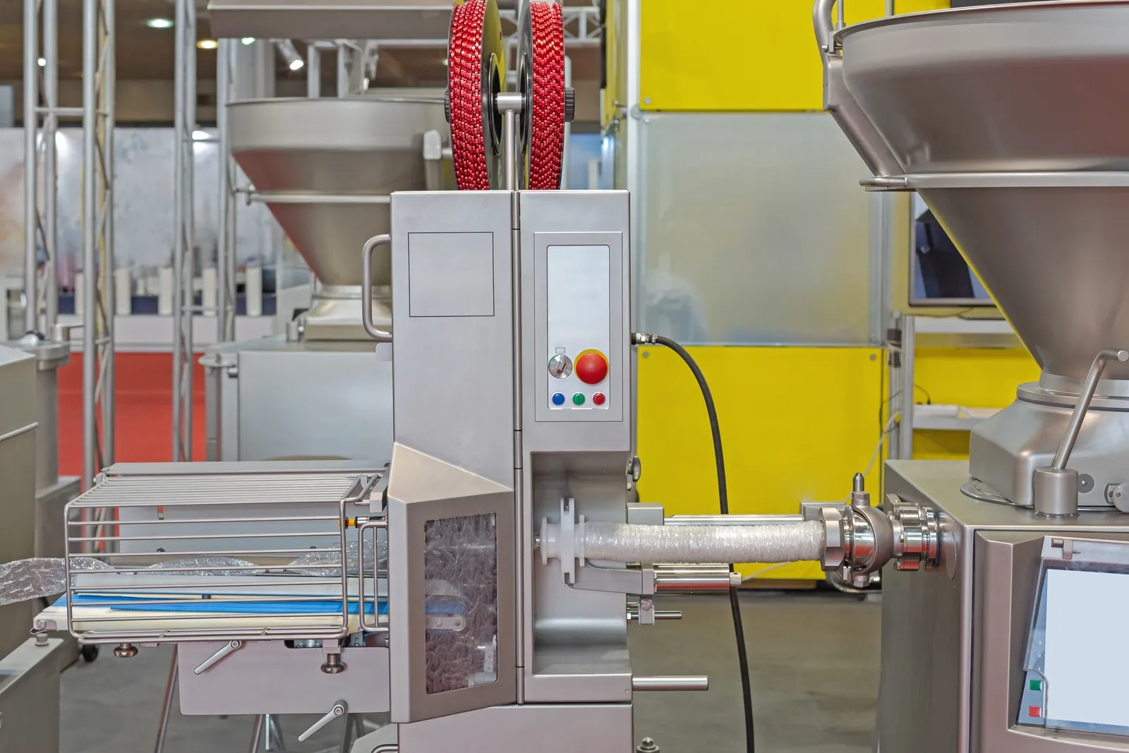 Sausage stuffing and portioning line